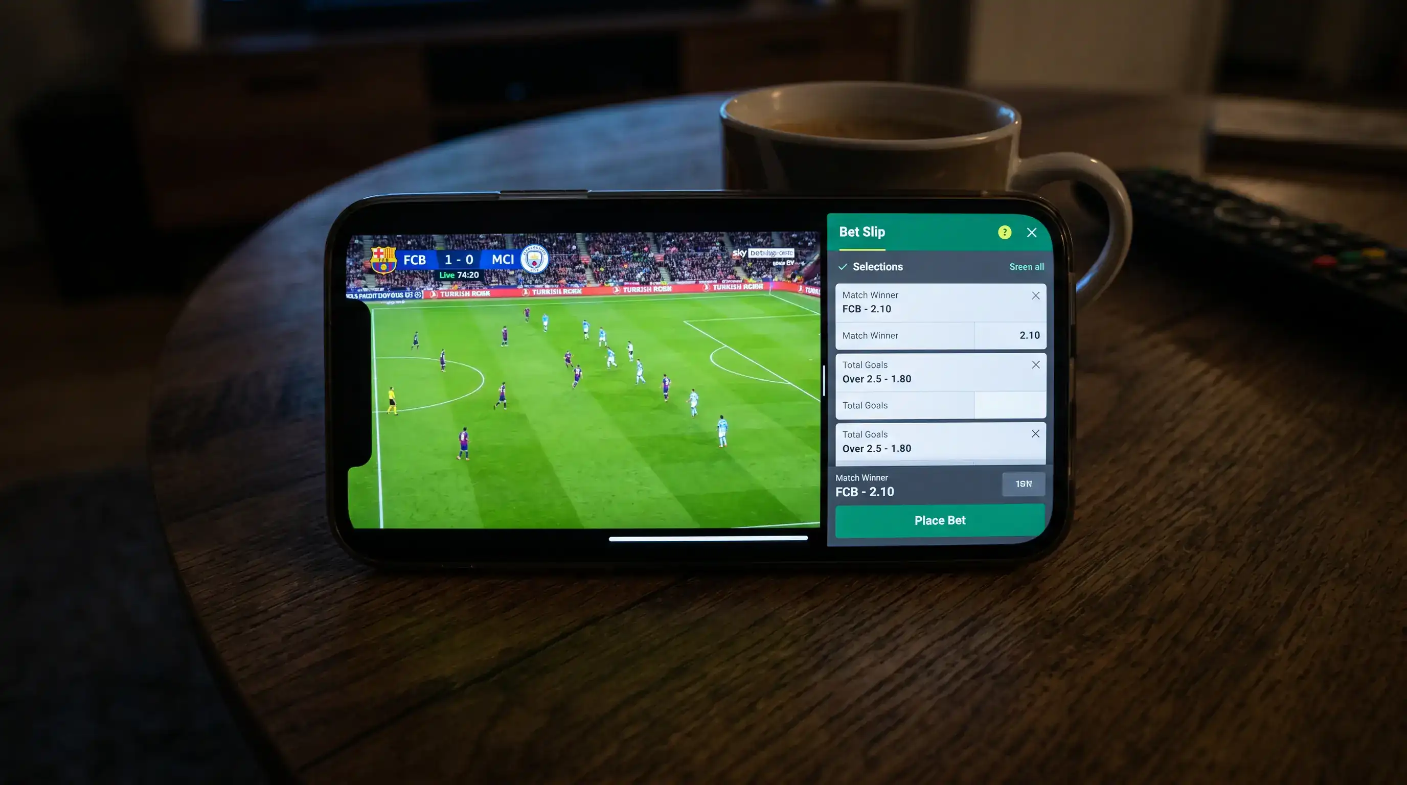 Football live stream playing inside a UK betting app with bet slip visible on screen