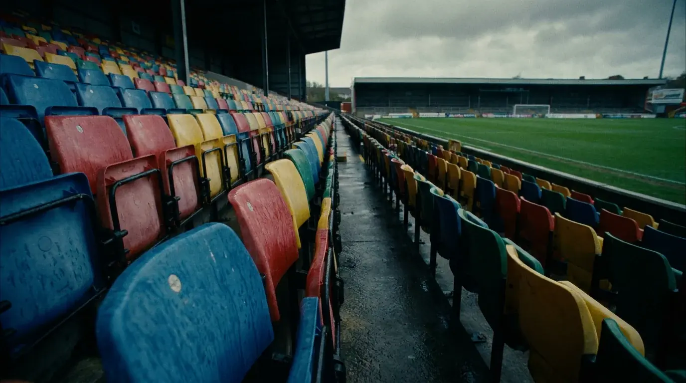 Empty football stadium seats symbolising reduced promotional budgets after tax rises